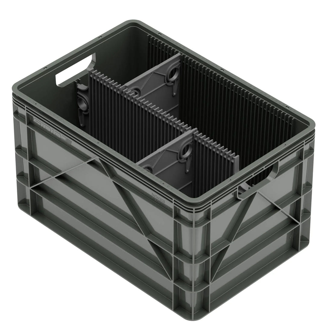 Dark grey SidioCrate full size storage crate for camper vans with internal dividers.