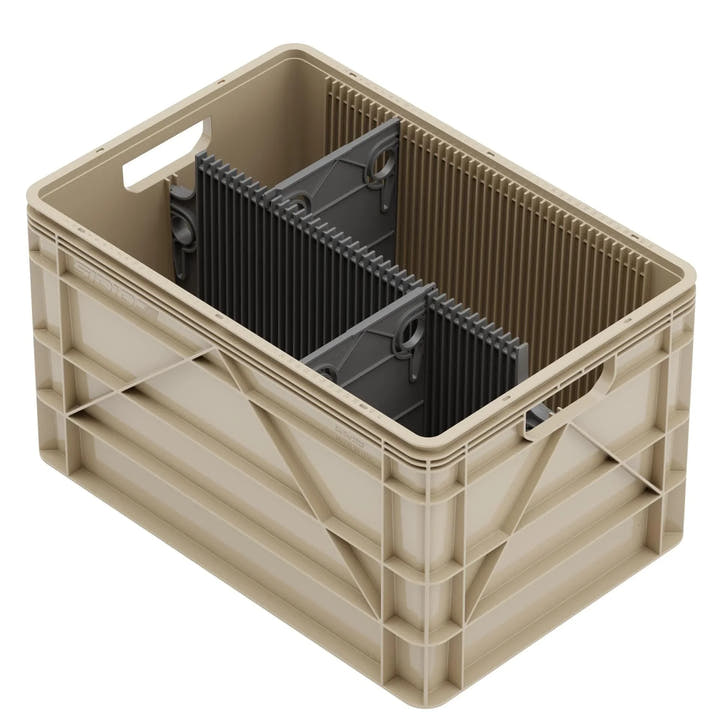 Tan SidioCrate storage bin with black internal dividers for camper van organization from AVC RIG.