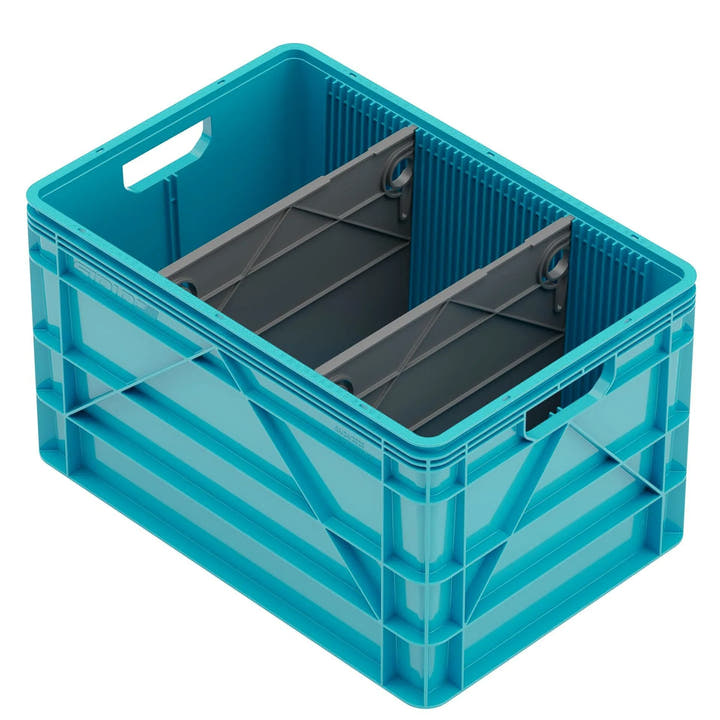 Blue SidioCrate storage bin with grey internal dividers for camper van organization.