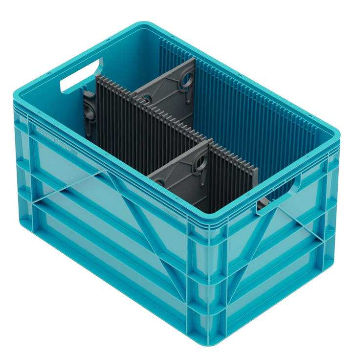 Blue SidioCrate storage container with black internal dividers for camper van organization.